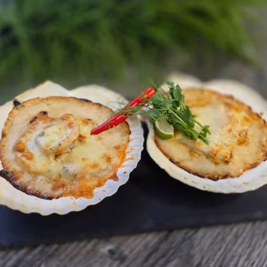 Фото Запеченные гребешки в раковинах